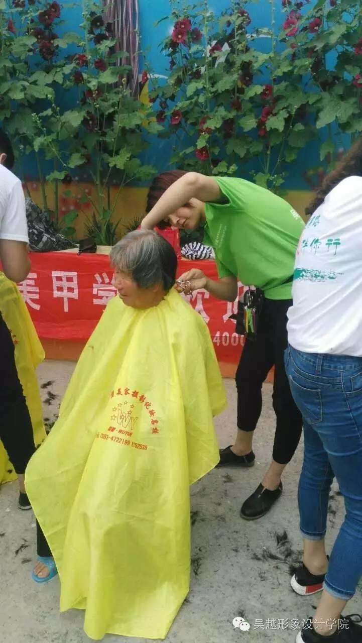 吴越学校六一儿童节关爱留守儿童义务理发活动